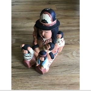 “Story teller” clay figurine